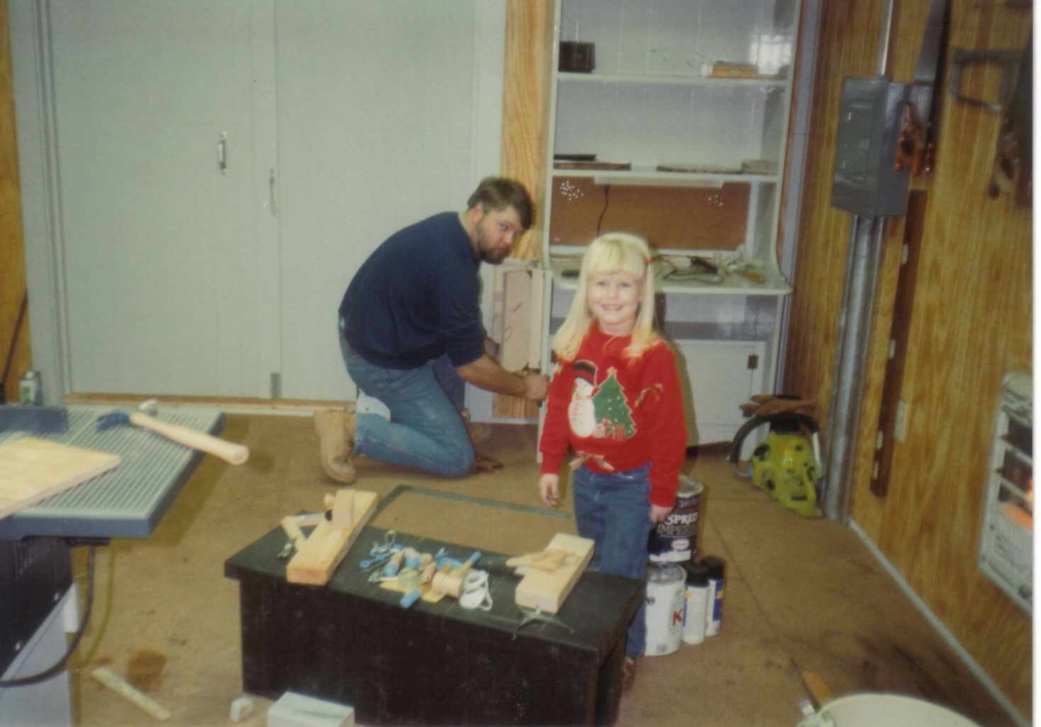 Sarah in her dad's workshop